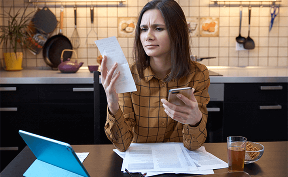 woman-looking-at-gas-bill