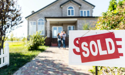 Home With Sold Sign