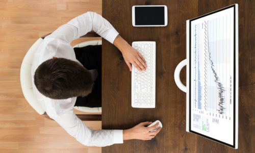 Man Investing In Overseas Shares Online