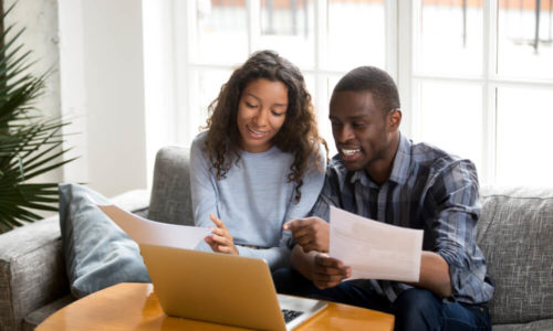 Couple Looking Over Home Loans and Rates